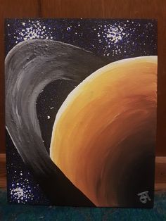 a painting of an orange and black planet