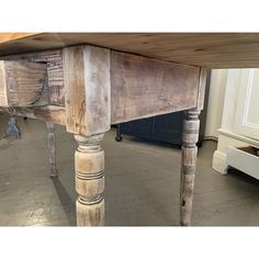 an old wooden table in a room