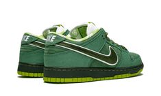 The Concepts x Nike SB Dunk Low “Green Lobster” was an extremely limited edition version of the 2018 "Lobster" Dunks from Boston sneaker boutique Concepts.  While the "Purple Lobster" Dunk combined Concepts' previous red and blue colorways, the "Green Lobster" edition was a mashup of its blue and yellow Nike SB Dunks.  The shoe is constructed with a combination of nubuck and leather on the upper in varying shades of green.  The picnic blanket-themed lining is done in a green and white checkerboa Lobster Shoes, Purple Lobster, Nike Sb Shoes, Sneaker Boutique, Yellow Nikes, Streetwear Accessories