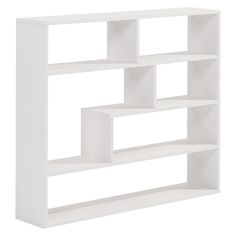 a white book shelf with four shelves on each side and three different sections in the middle