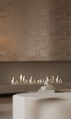 a modern fireplace in the middle of a room