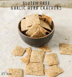 crackers in a bowl with the text gluten free garlic herb crackers