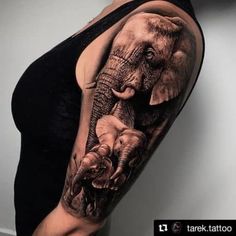 an elephant tattoo on the right arm and shoulder is shown in black and grey colors