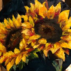 a painting of two sunflowers in a vase