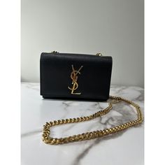 Brand: Saint Laurent (Ysl) Color: Black Material: Grained Leather Style: Wallet On Chain Strap: Gold-Tone Chain Strap Logo: Gold-Tone Ysl Logo On The Front Closure: Snap Button Closure Interior: [Provide Interior Details If Available, Such As Card Slots Or Compartments] Dimensions: [Provide Dimensions If Available] Condition: Excellent Condition, Barely Used Elevate Your Style With This Sophisticated Saint Laurent Wallet On Chain. Crafted From Luxurious Black Grained Leather, It Features A Stunning Gold-Tone Ysl Logo And Matching Chain Strap. This Chic Accessory Offers Both Elegance And Functionality, Perfect For Day-To-Night Transitions. Make A Statement With This Timeless Piece From Saint Saint Laurent Wallet On Chain, Ysl Logo, Wallet On Chain, Black Leather Wallet, Saint Laurent Wallet, Leather Style, Saint Laurent Bag, Chic Accessories, Logo Color