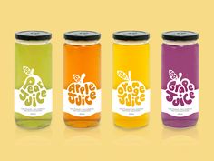 three jars filled with different colored liquids on top of a yellow background, one has an apple juice logo