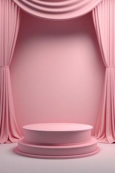 a pink stage with curtains and a round table