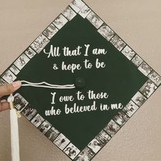 a graduation cap with the words all that i am and hope to be written on it