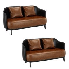 two brown leather couches with black legs and pillows on them, side by side