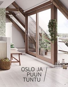 the interior of an apartment with wood and white walls, flooring and furniture is featured in this magazine