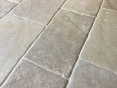 an image of a tile floor that looks like it has been cleaned and is ready to be used