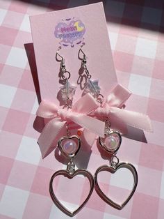 Adorable bow dangle earrings  🎀 Features stainless steel hooks and star charms ⸜(｡ ˃ ᵕ ˂ )⸝♡ 🎀 3" drop length 🎀 Stainless steel hooks 🎀 Follow @moonfactorydeco on ig for updates and new releases! 🎀 Questions? Message me and I'll be happy to help! Kawaii Dangle Jewelry For Party, Kawaii Silver Dangle Earrings, Silver Dangle Earrings In Kawaii Style, Earrings Y2k, Earrings Kawaii, Kawaii Earrings, Y2k Jewelry, Coquette Bow, Bow Earrings