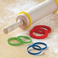 an olympic ring and rubber o - rings on the ground next to a water bottle