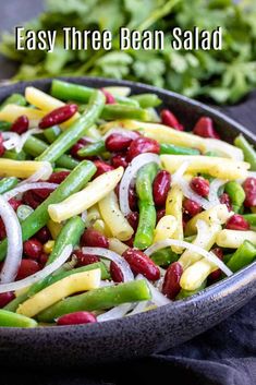 there is a bowl filled with beans and onions