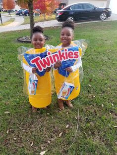 two children dressed up as twinkies in an inflatable bubble wrapper