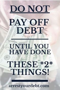 a person holding money with the words don't pay off debt until you have done these