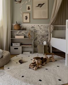 a child's room decorated in neutral colors