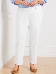 Talbots Hampshire Ankle Pants. Our versatile straight-leg silhouette. New Invisiflex Comfort Waist Technology has an invisible elastic back waistband that adjusts to your body for the perfect, comfortable fit. Fully lined double cloth fabric with stretch flatters all day, every day. Hello, legs. Also available in Talbots Hampshire Ankle Pants - Lined - Curvy Fit. Features Flat front/trouser Straight leg Hits at waist Ankle length Fly front with hook & bar closure Front slash, back welt pockets L Workwear Cropped Leg Pants With 4-way Stretch, Elegant Cropped Leg Dress Pants For Spring, White Straight Hem Bottoms For Office, Elegant Comfort Stretch Straight Pants, Spring Ankle-length Dress Pants With 4-way Stretch, 4-way Stretch Ankle-length Dress Pants, Stretch Cropped Leg Dress Pants For Business Casual, Tailored Spring Pants With 5-inch Inseam, Elegant Stretch Cropped Leg Bottoms