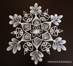 a drawing of a snowflake with leaves and swirls on it's surface