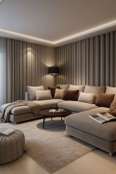 a living room filled with lots of furniture next to a wall covered in vertical blinds