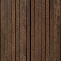 wood paneled wall with vertical slats in dark brown color, closeup view