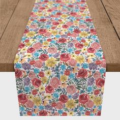 an image of a table runner with flowers on it