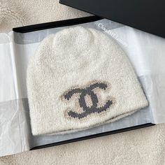 Authentic Brand New In Box Include: Box~ Can Be Worn Both Ways | White | Grey Modshot From Ig Influencer All Sales Are Final . Ig: Cloudsh.Luxury Please Feel Free To Msg Me If You Have Any Questions! Thank You! Chanel Beanie, Luxury Cream Wool Hat, Chanel Beanie Replica, Luxury Cashmere Beanie Hat, Luxury Wool Beanie, Luxury Black Beanie Hat, Designer Caps, Chanel Accessories, Money On My Mind