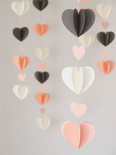 paper heart mobile hanging from the ceiling