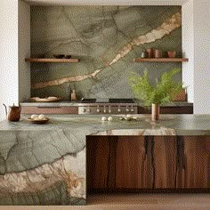 a kitchen with marble counter tops and wooden shelves on either side of the stove top