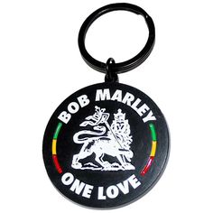 a keychain with the words bob marley one love in white and black on it