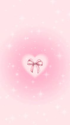 a pink heart with a bow on it's side and stars in the background