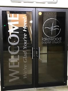 an open door with the words welcome to lakewood baptist church on it's side