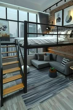 a loft bed is in the middle of a living room with stairs leading up to it