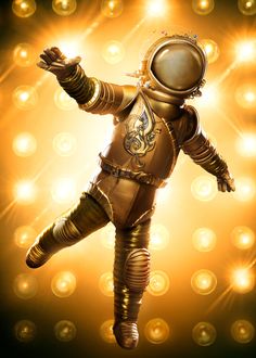 an image of a man in a space suit on stage with his arms out to the side