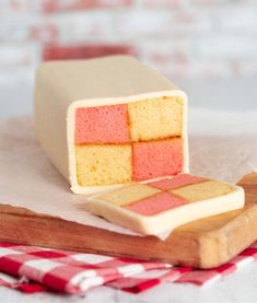 a piece of cake sitting on top of a plate next to a knife and fork