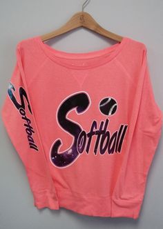 a pink sweatshirt with softball on it