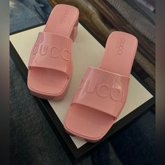 Brand New Women's Rubber Slide Sandal Pink Color - 100% Authentic Details - Size 34 I Think It Could Fit A Size 5 - Brand New Never Used - Good Condition - Comes With A Dust Bag And A Box - Authentic Cards - Color Pastel Pink Rubber Description A Playful Twist On An Essential Style, The Slide Sandal Is Presented In A Delicate Shade Of Pink Rubber For The Pre-Fall 2020 Collection. Recalling '90s Style, A Chunky Heel And Embossed Logo Add A Retro Appeal. Pastel Pink Rubber Women's Embossed Gucci L Designer Patent Leather Flat Sandals, Designer Patent Leather Slip-on Heels, Designer Gucci Sandals With Open Heel, Designer Patent Leather Sandals With Block Heel, Designer Patent Leather Block Heel Sandals, Gucci Luxury Sandals For Summer, Luxury Gucci Sandals For Summer, Chic Gucci Flat Sandals, Spring Luxury Gucci Sandals