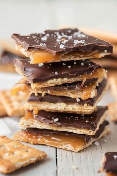 a stack of chocolate and caramel pretzel crackers on top of each other