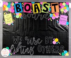 the bulletin board is decorated with colorful confetti and words that read boast