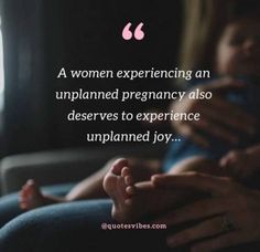 a woman is holding her baby in her lap with the caption, a women experiencing an unplanned pregnancy also deserves