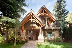 a large house with a stone walkway leading to the front door