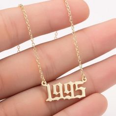 Old English Necklace,Birthday Gift Necklace,Anniversary Gifts,Birth Year Necklace Gold, Personalized Year Of Birth Necklace Dimensions: 10mm * 25mm Represent Your Birthyear With This Super Cute Old English Number Necklace! This Is Perfect For Birthyears, Anniversaries, Graduations, Etc! Super Chic And Versatile - Pairs Great With Any Outfit! Details: - Pendant Necklace - Zinc Alloy Chain - Zinc Alloy Pendant 2009 Necklace, Birth Necklace, Birth Year Necklace, Year Necklace, Birthday Necklace Gift, Number Necklace, Gold Fashion Necklace, Birth Year, Old English