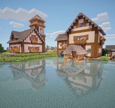 an image of some houses that are in the water with their reflection on the ground