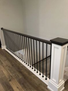 a white and black railing in a room