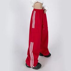 SPECIFICATIONSBrand Name: JMPRSStyle: StreetwearAge: JUNIOROrigin: Mainland ChinaCN: GuangdongSeason: Spring/SummerWaist Type: HIGHDecoration: PatchworkElasticity: Non StrechFabric Type: BroadclothPattern Type: stripedPant Style: Wide Leg PantsMaterial: PolyesterFit Type: LOOSELength: Full LengthPlace Of Origin: China (Mainland)Closure Type: Elastic WaistGender: WOMENModel Number: FC02279Front Style: FlatChoice: yes Hip Hop Sweatpants, Printed Denim Pants, Loose Wide Leg Pants, Curated Outfit, Streetwear Chic, Striped Pant, Women Cargo Pants, Tie Dye Denim, High Waist Fashion