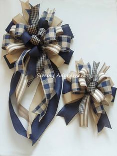 two blue and white bows on top of each other