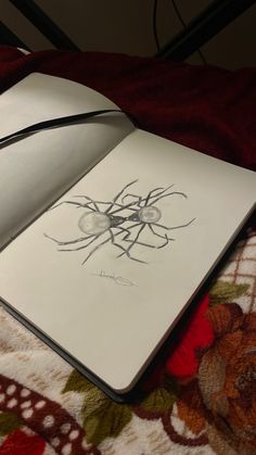 an open book with a drawing on it