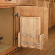 an open cabinet door in a kitchen