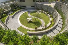 an aerial view of a circular garden area