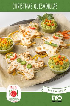 christmas quesadillas on a platter with guacamole and salsa